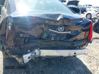 2014 Cadillac XTS with VIN 2G61L5S38E9202763, listed as a IAAI auction lot 41820564 with 117,709 mi miles. Bid and sale history available at carsss.com. Image 6.
