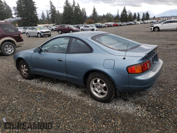 1995 Toyota Celica ST with VIN JT2AT00N7S0047304, listed as a Copart auction lot 77003784 with 423,438 mi miles and Salvage Title. Bid and sale history available at carsss.com. Image 2.