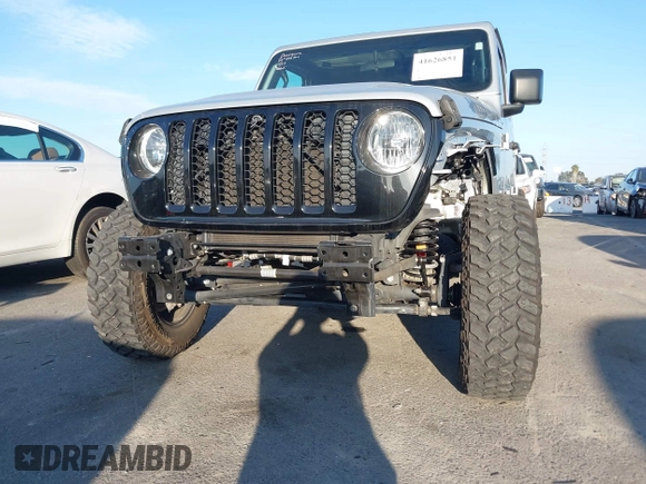 2022 Jeep Gladiator Willys with VIN 1C6HJTAG4NL132558, listed as a IAAI auction lot 41626851 with 28,251 mi miles and . Bid and sale history available at DreamBid. Image 20.