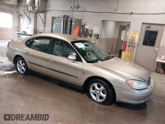 2001 Ford Taurus SES with VIN 1FAFP55S31A143202, listed as a IAAI auction lot 41950702 with 238,193 mi miles. Bid and sale history available at carsss.com. Image 1.