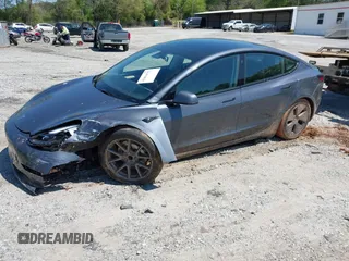 2023 Tesla Model 3 z VIN 5YJ3E1EA0PF655244, wystawiony jako IAAI lot #42004592 z przebiegiem 54 860 mil mil oraz . Historia ofert i sprzedaży dostępna na DreamBid. Obrazek 2.