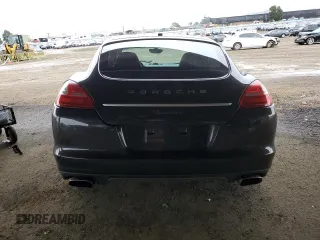 2013 Porsche Panamera с VIN WP0AA2A7XDL015781, выставлен на аукционе Copart как лот 84434804 с пробегом Не указан миль и Списание • Salvage title. История ставок и продаж доступна на DreamBid. Изображение 6.