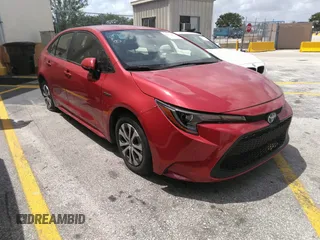 2021 Toyota Corolla Hybrid LE with VIN JTDEAMDE5MJ012662, listed as a IAAI auction lot 41421205 with 138,533 mi miles. Bid and sale history available at carsss.com. Image 1.