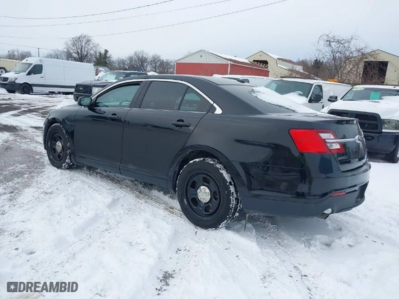2014 Ford Sedan Police Interceptor with VIN 1FAHP2MK9EG101144, listed as a IAAI auction lot 41449872 with 160,659 mi miles. Bid and sale history available at carsss.com. Image 3.