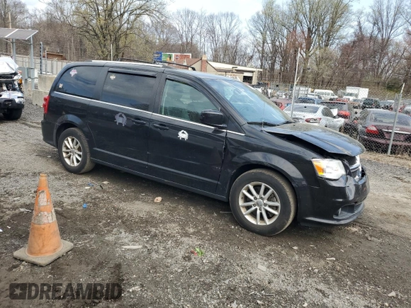 2018 Dodge Grand Caravan SXT with VIN 2C4RDGCG7JR307363, listed as a Copart auction lot 51110115 with 124,812 mi miles and Salvage Title. Bid and sale history available at DreamBid. Image 4.