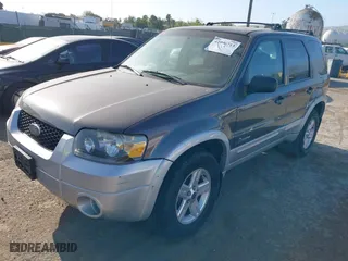 2006 Ford Escape Hybrid with VIN 1FMCU96H76KA56562, listed as a IAAI auction lot 42096713 with 148,963 mi miles. Bid and sale history available at carsss.com. Image 2.
