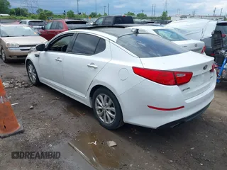 2015 Kia Optima EX with VIN 5XXGN4A71FG356581, listed as a IAAI auction lot 42365202 with Not provided miles and . Bid and sale history available at DreamBid. Image 3.