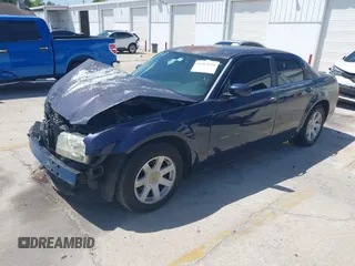 2005 Chrysler 300 with VIN 2C3JA53G25H167944, listed as a IAAI auction lot 41963114 with 196,635 mi miles. Bid and sale history available at carsss.com. Image 18.
