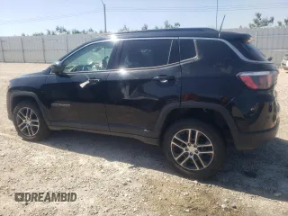 2018 Jeep Compass Altitude with VIN 3C4NJDBBXJT493439, listed as a Copart auction lot 58664835 with 96,928 mi miles and Salvage title. Bid and sale history available at DreamBid. Image 2.