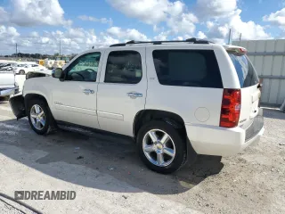 2012 Chevrolet Tahoe LTZ with VIN 1GNSCCE08CR214560, listed as a Copart auction lot 44723175 with 137,489 mi miles and Salvage title. Bid and sale history available at DreamBid. Image 2.