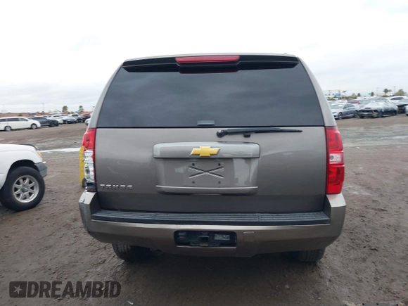 2013 Chevrolet Tahoe LS with VIN 1GNSCAE06DR105066, listed as a IAAI auction lot 41586288 with 161,639 mi miles and . Bid and sale history available at DreamBid. Image 16.