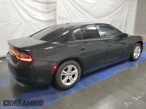 2019 Dodge Charger SXT with VIN 2C3CDXBG7KH657997, listed as a Copart auction lot 52040545 with 163,735 mi miles and Clean Title. Bid and sale history available at carsss.com. Image 3.