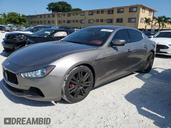 2014 Maserati Ghibli S Q4 z VIN ZAM57RTA6E1090293, wystawiony jako Copart lot #57298875 z przebiegiem 113 805 mil mil oraz Tytuł czysty. Historia ofert i sprzedaży dostępna na DreamBid. Obrazek 1.
