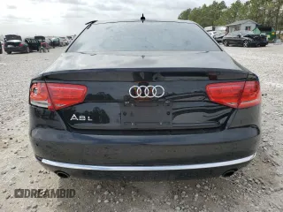 2014 Audi A8 3.0T z VIN WAURGAFD2EN002567, wystawiony jako Copart lot #48188395 z przebiegiem 159 477 mil mil oraz Szkody całkowita. Historia ofert i sprzedaży dostępna na DreamBid. Obrazek 6.