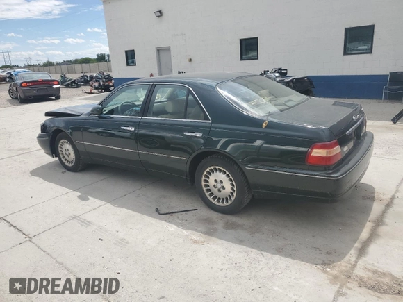 1999 Infiniti Q45 z VIN JNKBY31A6XM600579, wystawiony jako Copart lot #57683075 z przebiegiem 215 415 mil mil oraz Szkoda całkowita • Salvage title. Historia ofert i sprzedaży dostępna na DreamBid. Obrazek 2.