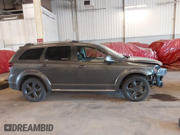 2019 Dodge Journey Crossroad z VIN 3C4PDCGG9KT717767, wystawiony jako IAAI lot #42179967 z przebiegiem 98 686 mil mil oraz . Historia ofert i sprzedaży dostępna na DreamBid. Obrazek 13.