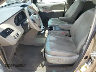 2012 Toyota Sienna XLE AAS with VIN 5TDYK3DC1CS277339, listed as a Copart auction lot 57494715 with 240,666 mi miles and Salvage title. Bid and sale history available at DreamBid. Image 7.