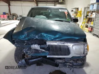 1998 Mercury Mountaineer z VIN 4M2ZU55PXWUJ01704, wystawiony jako Copart lot #50892605 z przebiegiem 196 987 mil mil oraz Szkoda całkowita • Salvage title. Historia ofert i sprzedaży dostępna na DreamBid. Obrazek 5.