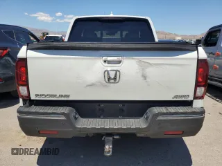2020 Honda Ridgeline RTL-E z VIN 5FPYK3F79LB011109, wystawiony jako Copart lot #56551735 z przebiegiem 86 832 mil mil oraz Szkoda całkowita • Salvage title. Historia ofert i sprzedaży dostępna na DreamBid. Obrazek 6.