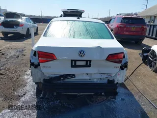 2016 Volkswagen Jetta Sedan 1.4T S w/Technology with VIN 3VW267AJ1GM284752, listed as a IAAI auction lot 41779951 with 164,880 mi miles. Bid and sale history available at carsss.com. Image 17.