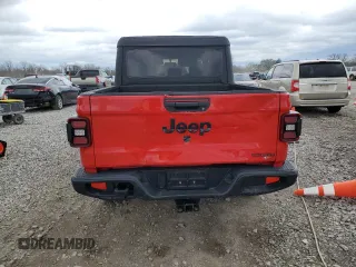 2020 Jeep Gladiator Sport S with VIN 1C6HJTAG0LL131338, listed as a Copart auction lot 50883235 with 50,547 mi miles and Salvage title. Bid and sale history available at DreamBid. Image 6.