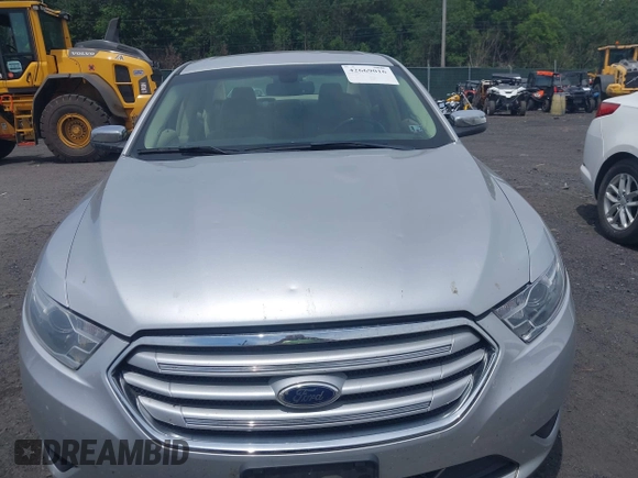 2014 Ford Taurus Limited with VIN 1FAHP2F82EG132673, listed as a IAAI auction lot 42669016 with 125,567 mi miles and . Bid and sale history available at DreamBid. Image 12.