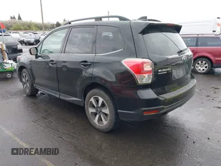 2018 Subaru Forester Premium with VIN JF2SJGEC4JH581718, listed as a IAAI auction lot 41988454 with 76,376 mi miles. Bid and sale history available at carsss.com. Image 3.