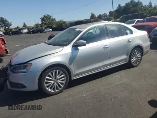 2012 Volkswagen Jetta SEL with VIN 3VWLP7AJ6CM324271, listed as a Copart auction lot 59986855 with 129,002 mi miles and Salvage title. Bid and sale history available at DreamBid. Image 1.