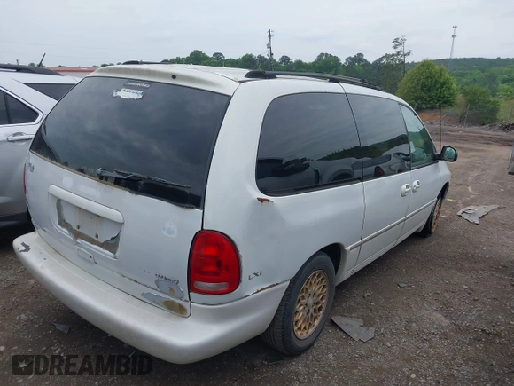 1998 Chrysler Town & Country LXi with VIN 1C4GP64L9WB664179, listed as a IAAI auction lot 42041600 with Not Provided miles. Bid and sale history available at carsss.com. Image 6.