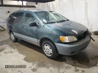 2001 Toyota Sienna LE with VIN 4T3ZF13C21U364516, listed as a Copart auction lot 79759924 with 100,185 mi miles and Salvage Title. Bid and sale history available at carsss.com. Image 4.