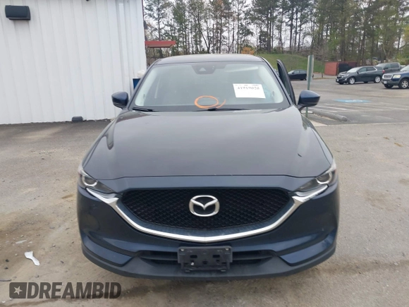 2017 Mazda CX-5 Touring with VIN JM3KFBCL9H0163449, listed as a IAAI auction lot 41919020 with 102,898 mi miles. Bid and sale history available at carsss.com. Image 12.