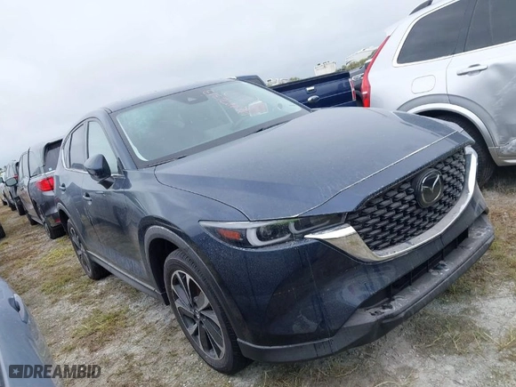 2022 Mazda CX-5 2.5 S Premium Package with VIN JM3KFBDMXN1618807, listed as a IAAI auction lot 40476313 with NaN miles. Bid and sale history available at carsss.com. Image 1.