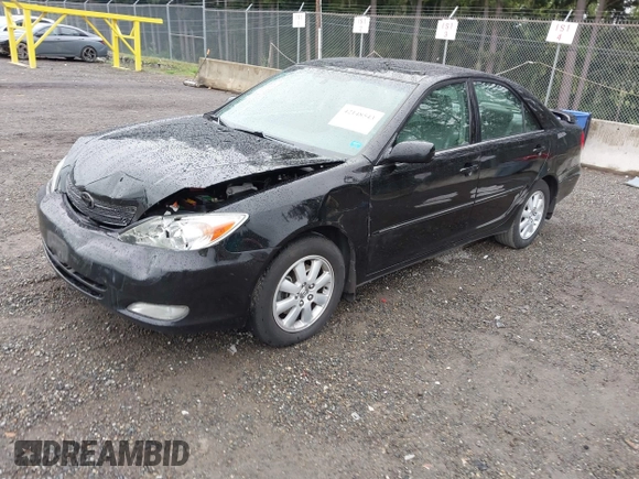 2003 Toyota Camry LE z VIN 4T1BF30KX3U049919, wystawiony jako IAAI lot #42148543 z przebiegiem 208 140 mil mil oraz . Historia ofert i sprzedaży dostępna na DreamBid. Obrazek 10.