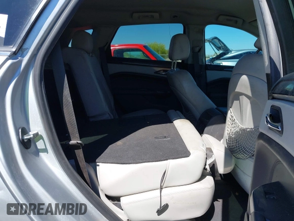 2014 Cadillac SRX with VIN 3GYFNAE31ES576016, listed as a IAAI auction lot 42130992 with 160,114 mi miles and . Bid and sale history available at DreamBid. Image 8.