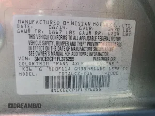 2015 Nissan Note SR with VIN 3N1CE2CP1FL376255, listed as a Copart auction lot 59234455 with 84,686 mi miles and Salvage title. Bid and sale history available at DreamBid. Image 12.