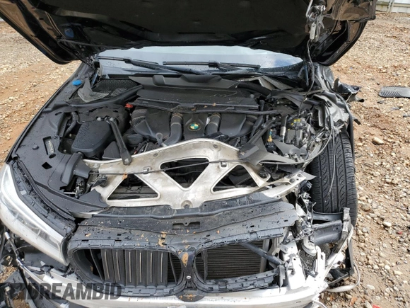 2016 BMW 7 Series 750i with VIN WBA7F0C55GGM20825, listed as a Copart auction lot 47743955 with 0 mi miles and Salvage Title. Bid and sale history available at carsss.com. Image 12.