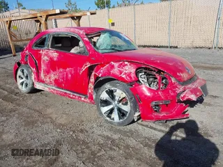 2014 Volkswagen Beetle Turbo R-Line with VIN 3VWVT7AT0EM603434, listed as a IAAI auction lot 41944413 with 64,470 mi miles and . Bid and sale history available at DreamBid. Image 1.