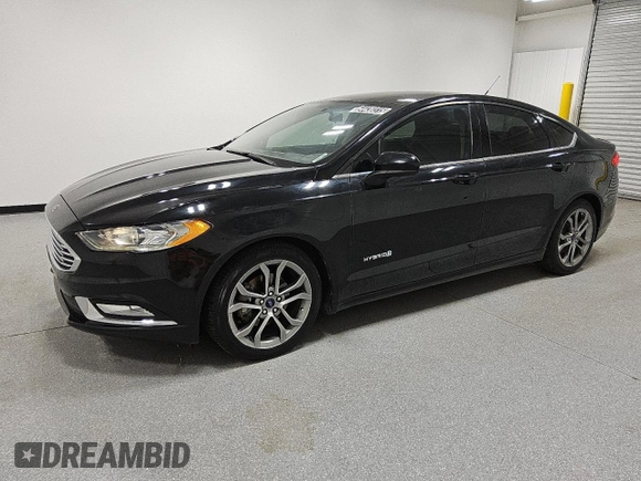2017 Ford Fusion Hybrid SE with VIN 3FA6P0LU9HR216757, listed as a Copart auction lot 64430315 with 106,247 mi miles and Clean title. Bid and sale history available at DreamBid. Image 1.