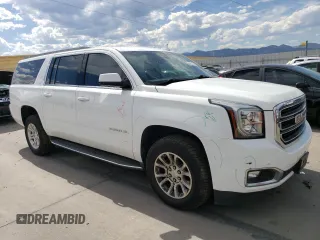 2019 GMC Yukon XL SLT with VIN 1GKS2GKC5KR362816, listed as a Copart auction lot 69062794 with 96,321 mi miles and Salvage Title. Bid and sale history available at DreamBid. Image 4.