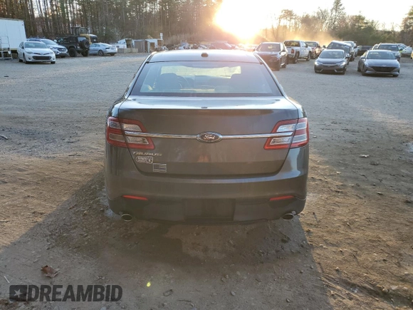 2015 Ford Taurus SE with VIN 1FAHP2D86FG184747, listed as a Copart auction lot 77659254 with 140,404 mi miles and Clean Title. Bid and sale history available at carsss.com. Image 6.