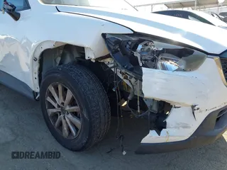 2013 Mazda CX-5 Sport with VIN JM3KE2BE4D0153251, listed as a IAAI auction lot 42297235 with 177,019 mi miles and . Bid and sale history available at DreamBid. Image 17.