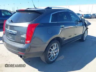 2013 Cadillac SRX Performance Collection with VIN 3GYFNDE38DS568561, listed as a IAAI auction lot 41701063 with 139,191 mi miles. Bid and sale history available at carsss.com. Image 4.