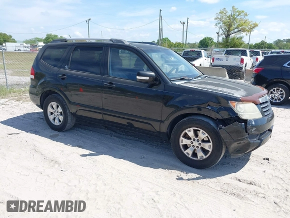 2009 Kia Borrego LX with VIN KNDJJ741X95022410, listed as a IAAI auction lot 41801442 with 163,775 mi miles. Bid and sale history available at carsss.com. Image 1.