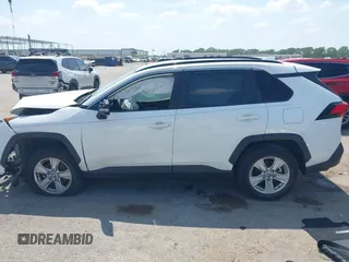 2021 Toyota RAV4 XLE with VIN JTMW1RFV2MD063839, listed as a IAAI auction lot 42406891 with 69,490 mi miles and . Bid and sale history available at DreamBid. Image 14.