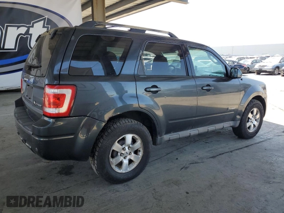 2010 Ford Escape Hybrid z VIN 1FMCU5K30AKA77460, wystawiony jako Copart lot #56363305 z przebiegiem 294 973 mil mil oraz Czysty tytuł • Clean title. Historia ofert i sprzedaży dostępna na DreamBid. Obrazek 3.