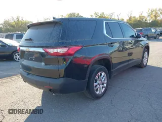 2019 Chevrolet Traverse LS with VIN 1GNERFKWXKJ198719, listed as a IAAI auction lot 40668986 with 99,917 mi miles. Bid and sale history available at carsss.com. Image 4.