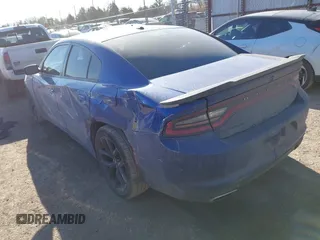 2019 Dodge Charger SXT with VIN 2C3CDXBG0KH588294, listed as a IAAI auction lot 41666566 with 113,874 mi miles. Bid and sale history available at carsss.com. Image 3.