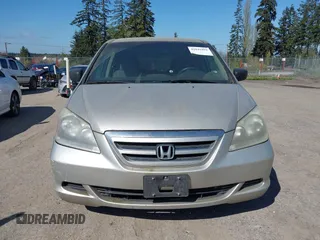 2006 Honda Odyssey LX with VIN 5FNRL38236B127129, listed as a IAAI auction lot 42041994 with 282,313 mi miles. Bid and sale history available at carsss.com. Image 12.