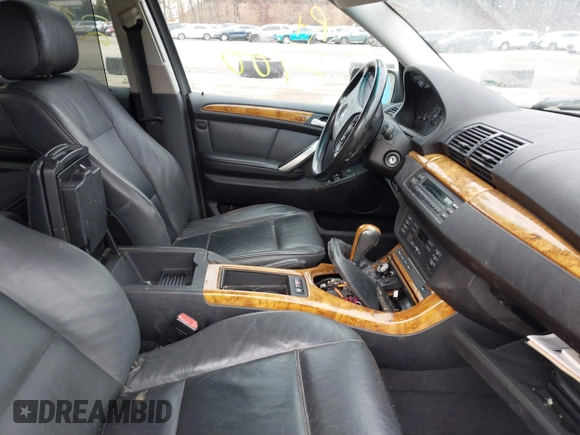 2001 BMW X5 3.0i with VIN WBAFA53571LM67411, listed as a IAAI auction lot 41727600 with 999,999 mi miles. Bid and sale history available at carsss.com. Image 5.