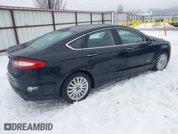 2016 Ford Fusion Energi SE Luxury with VIN 3FA6P0PU3GR166009, listed as a IAAI auction lot 41626623 with 133,596 mi miles. Bid and sale history available at carsss.com. Image 4.